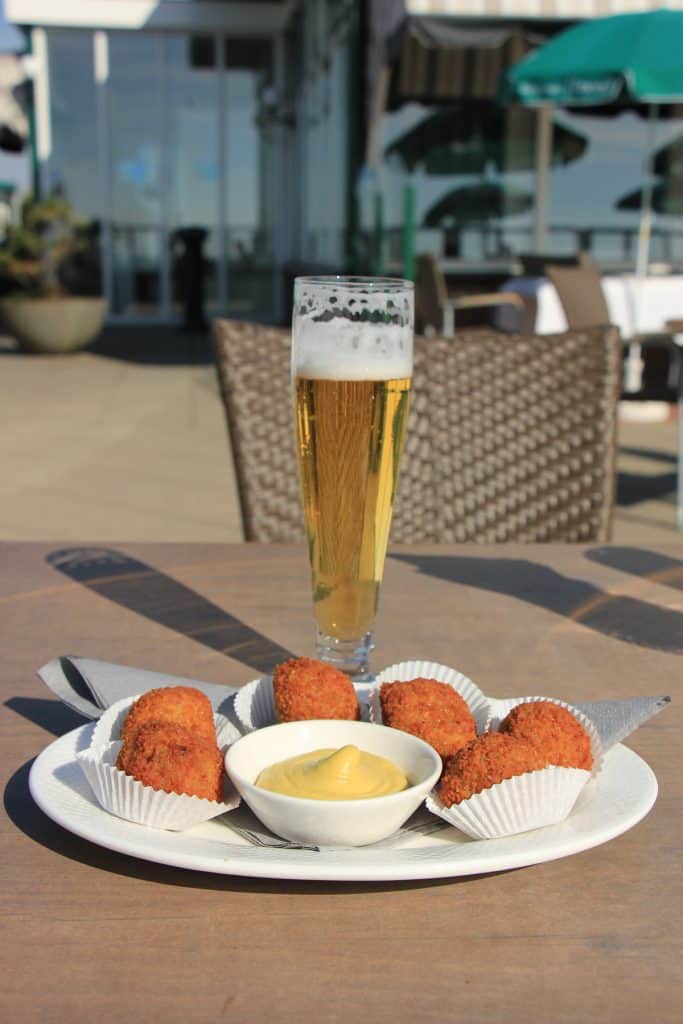 bitterballen-and-a-drink Bitterballen and a Beer on a terrace in Amsterdam, If the Dutch people are Rude we wouldn't have these cozy moments.