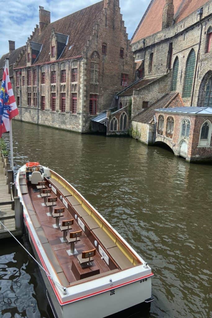 Canal boat tour boat in Bruges, Belgium.