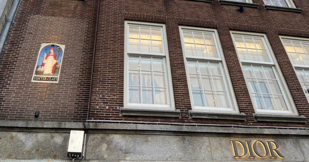 Find the Sinterklaas gable at the De Bisschop Building Dam Square Amsterdam.