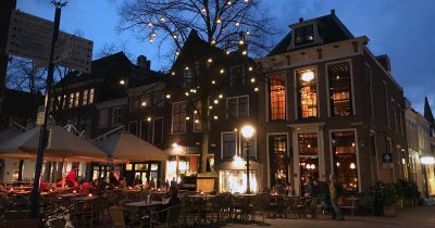 Old town Delft terrace at night.