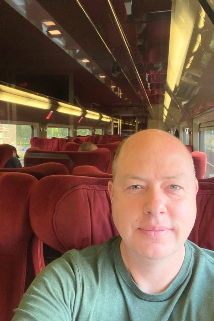 Gerrit sitting in 1st class carriage Eurostar between Amsterdam and Antwerp.