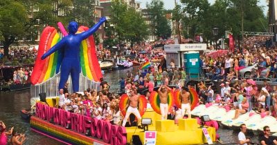 Gay Pride Amsterdam one of the boats during the canal parade: show your true colors.