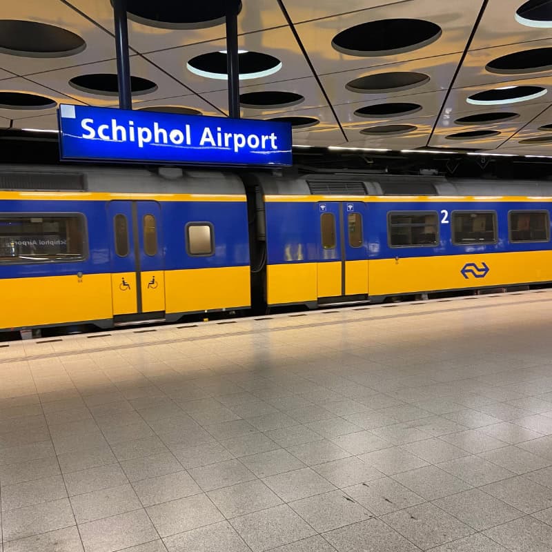 Intercity train at Schiphol Airport station.