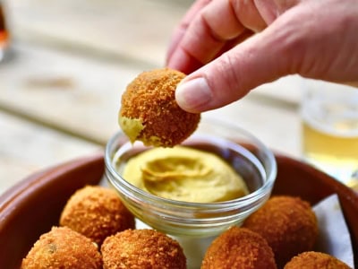 Tasting Bitterballen during a Amsterdam Food Tour.