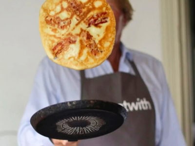 Learn how to bake Dutch pancakes in a beautiful Amsterdam canal house.