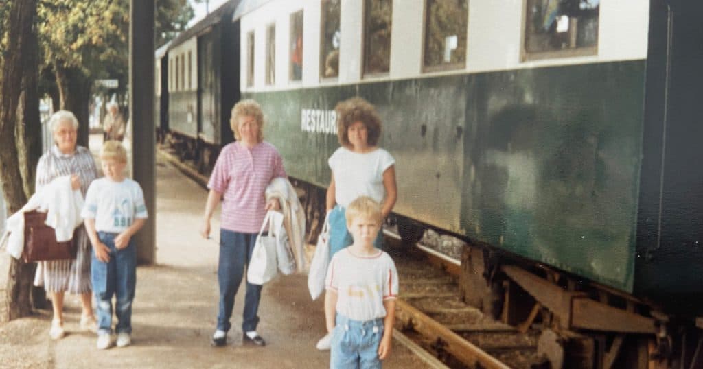 My grandmother on the far left, me right next to her, with my aunt, mom, and brother.