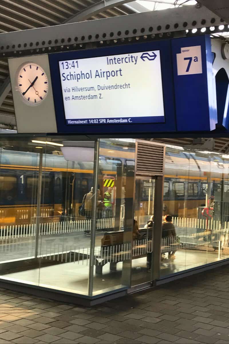 NS departure screen at platform 7a showing the 13:41 Intercity to Schiphol Airport via Hilversum and Amsterdam Zuid.